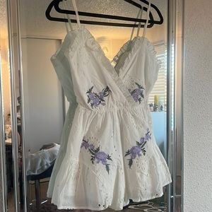White romper with lilac flowers